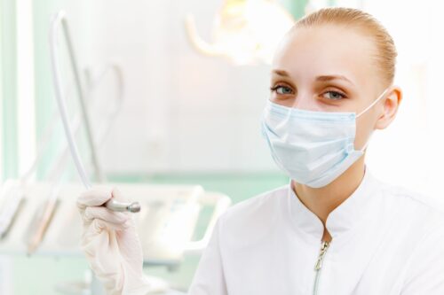 a portrait of a dental worker, dentist or assistant