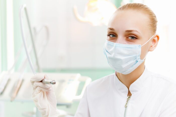 a portrait of a dental worker, dentist or assistant